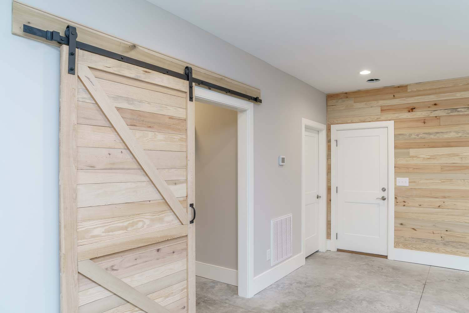 Pine Knoll Shores custom home design barn doors